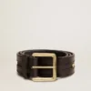 Cintura da donna nera in pelle lavata con borchie dorate