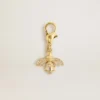 Ciondolo a forma di ape in ottone color oro con cristalli