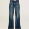 Jeans da donna a zampa con lavaggio vintage e dettagli metallici