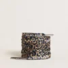 Lacci beige con stampa leopardata e logo bianco a contrasto
