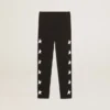 Leggings neri per bambine con stelle bianche sui lati