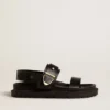 Sandalo da donna Lucy in pelle nera lucida con fibbia in metallo dorato