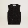 Top in maglia a rete nera con paillettes e dettagli a contrasto