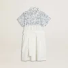 Abito camicia da bambina in tela di cotone bianca con stampa nautica blu e bordino bianco