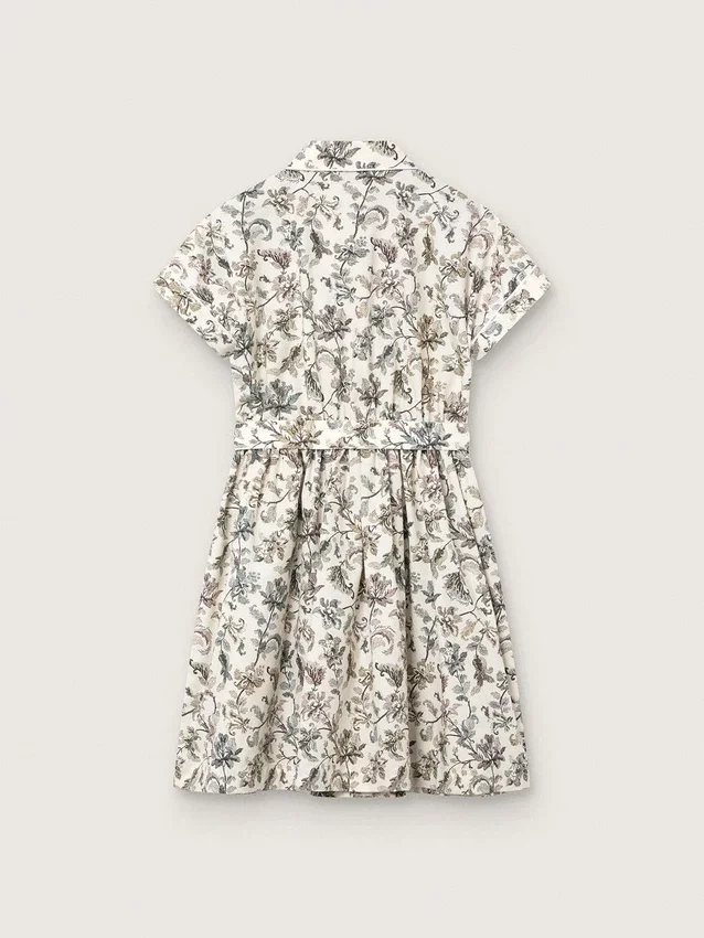 Abito da bambina “Journey” in tela di cotone bianca con stampa floreale verde