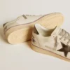 Ball Star in rete e pelle con stella in pelle metallizzata e linguetta sul tallone