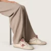Ball Star LTD da donna in pelle beige con stella in rete rosa e linguetta sul tallone in pelle blu
