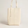Borsa 24/7 North South in pelle color burro con manici regolabili