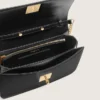 Borsa Gioia in pelle rigida nera con dettagli dorati