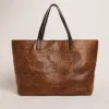 Borsa Pasadena in pelle martellata con stampa leopardata e manici neri a contrasto