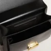 Borsa Venezia in pelle nera rigida con dettagli dorati