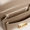 Borsa Venezia piccola in pelle beige a doghe con dettagli dorati