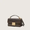 Borsa Venezia piccola in pelle marrone scuro con fibbia dorata