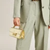 Borsa Venezia piccola in pelle metallizzata dorata con dettagli dorati