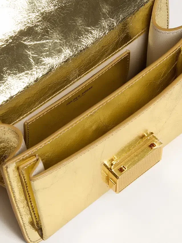 Borsa Venezia piccola in pelle metallizzata dorata con dettagli dorati