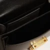 Borsa Venezia piccola in pelle nera rigida con dettagli dorati
