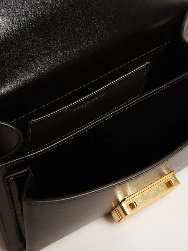 Borsa Venezia piccola in pelle nera rigida con dettagli dorati