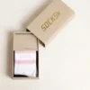 Calzini a costine con strisce rosa e logo