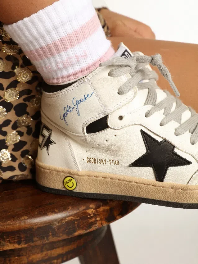 Calzini a costine con strisce rosa e logo