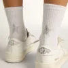 Calzini bianchi con stella di cristallo sul retro
