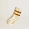 Calzini bianchi da bambino con strisce color tabacco