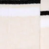 Calzini color cipria con dettagli consumati e strisce bianche e nere