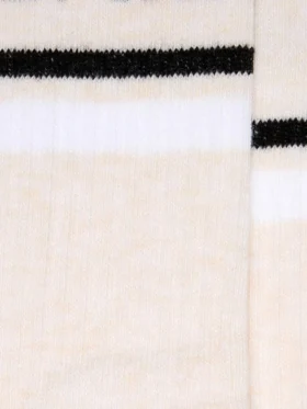 Calzini color cipria con dettagli consumati e strisce bianche e nere