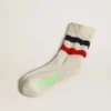 Calzini in cotone bianco con finitura invecchiata e strisce rosse e blu navy