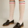 Calzini lunghi a coste in bianco vintage con strisce bicolori