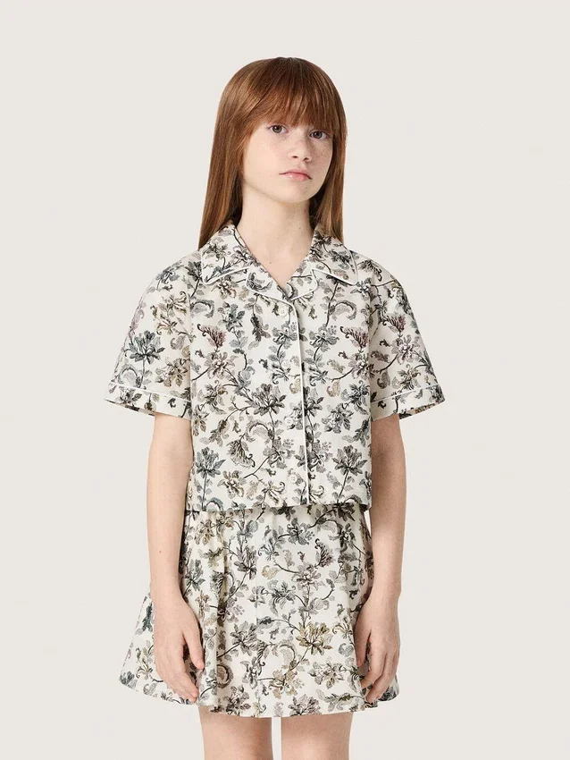 Camicia da bambina Journey a maniche corte in tela di cotone bianca con stampa floreale verde