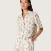 Camicia da donna squadrata in cotone con stampa floreale in bianco e nero