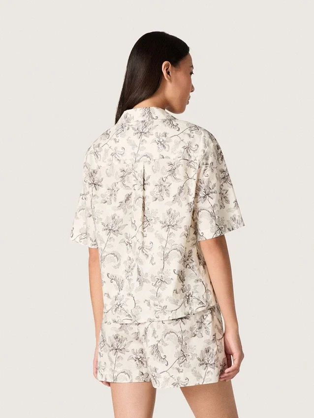 Camicia da donna squadrata in cotone con stampa floreale in bianco e nero