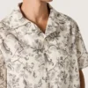 Camicia da uomo a maniche corte in cotone con stampa floreale in bianco e nero