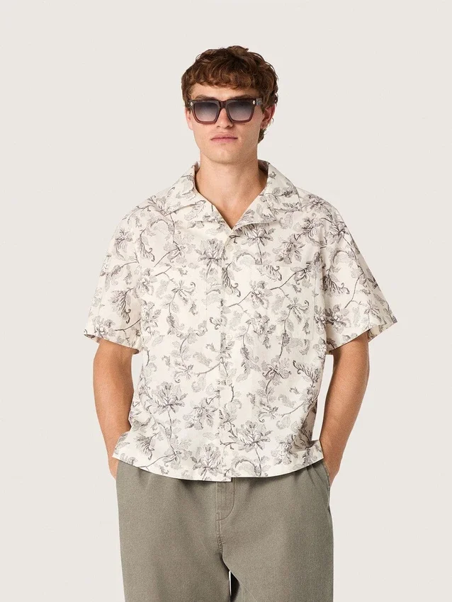 Camicia da uomo a maniche corte in cotone con stampa floreale in bianco e nero