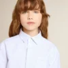 Camicie a righe per bambine con scritta ricamata sulla tasca