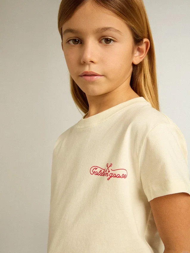 Camicie da bambina in cotone bianco slavato con ricamo rosso sul petto