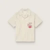 Camicie da bambino a righe color ecru, beige e grigio con ricamo “Frutteria Golden”