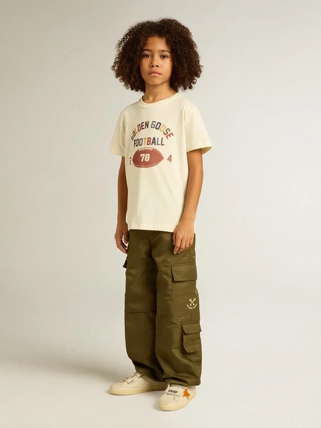 Camicie da bambino in bianco consumato con scritte multicolori
