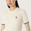 Camicie da donna in maglia bianca con bordi a contrasto e spilla rimovibile