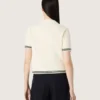 Camicie da donna in maglia bianca con bordi a contrasto e spilla rimovibile