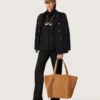 Camicie da donna in twill di lana nero con ricami floreali in perline di vetro