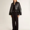 Camicie da donna nere a righe verticali con chiusura a nodo laterale