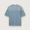 Camicie unisex in cotone azzurro con stampa rovesciata sul retro