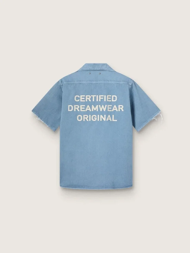 Camicie unisex in denim azzurro con ricamo sul retro