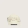 Cappellino da baseball color crema con toppa tono su tono “Golden” e spilla a forma di stella verde