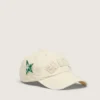 Cappellino da baseball color crema con toppa tono su tono “Golden” e spilla a forma di stella verde