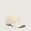 Cappellino da baseball color ecrù con stella ricamata tono su tono