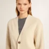 Cardigan da donna beige con scritta “Golden” sul retro