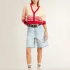 Cardigan da donna color crema con strisce rosse