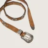 Cintura sottile in pizzo di nabuk color nocciola con intarsi decorativi